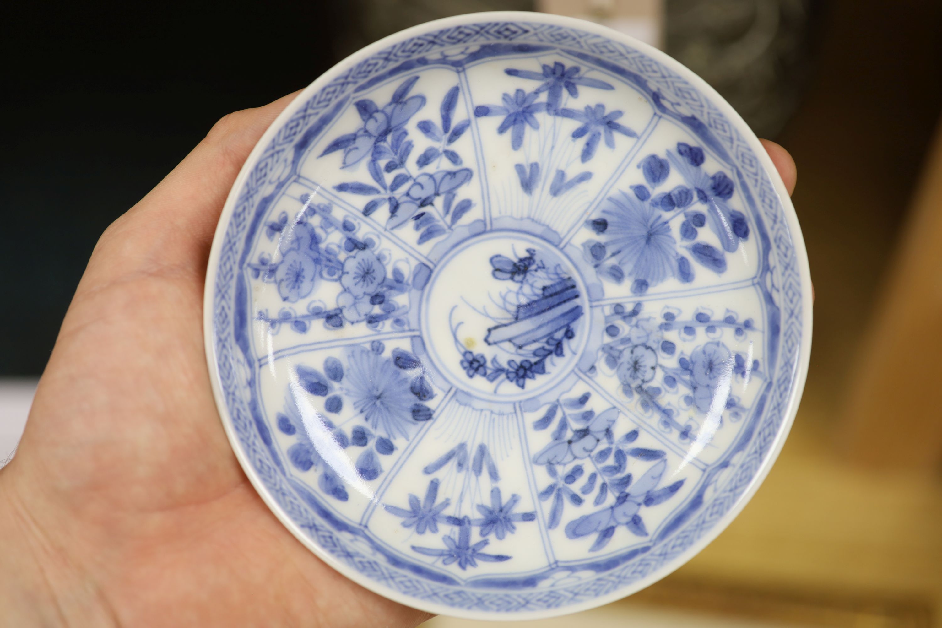 A Chinese blue and white bowl, diameter 15cm, a tea bowl and saucer, a crackleglaze shell dish and a celadon glazed stem cup